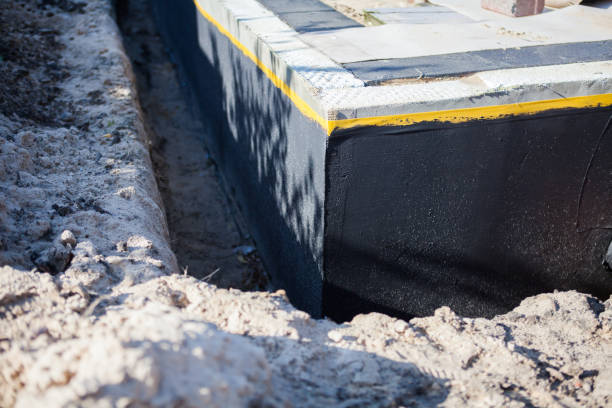 Professional Waterproofing technician working in Englewood, OH